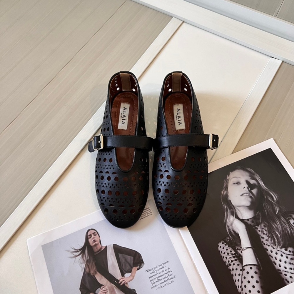 Alaia Black Quilted Flats with Buckle Detail